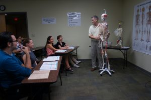 Sean teaching Anatomy for medical massage therapy school